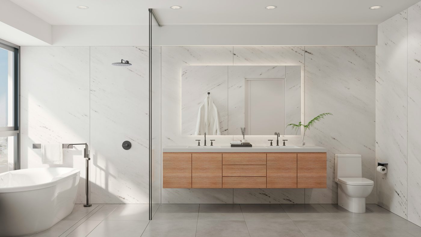 Baño moderno reformado con mueble de madera y encimera